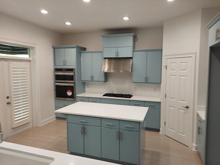 Is cabinet painting worth it vs full kitchen remodeling